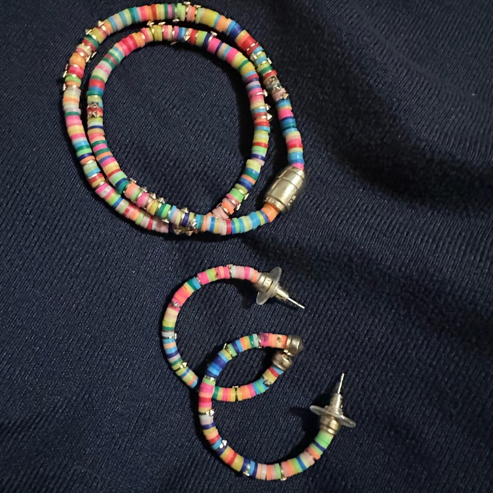 Kendra Scott Neon Hoops and wrap bracelet.